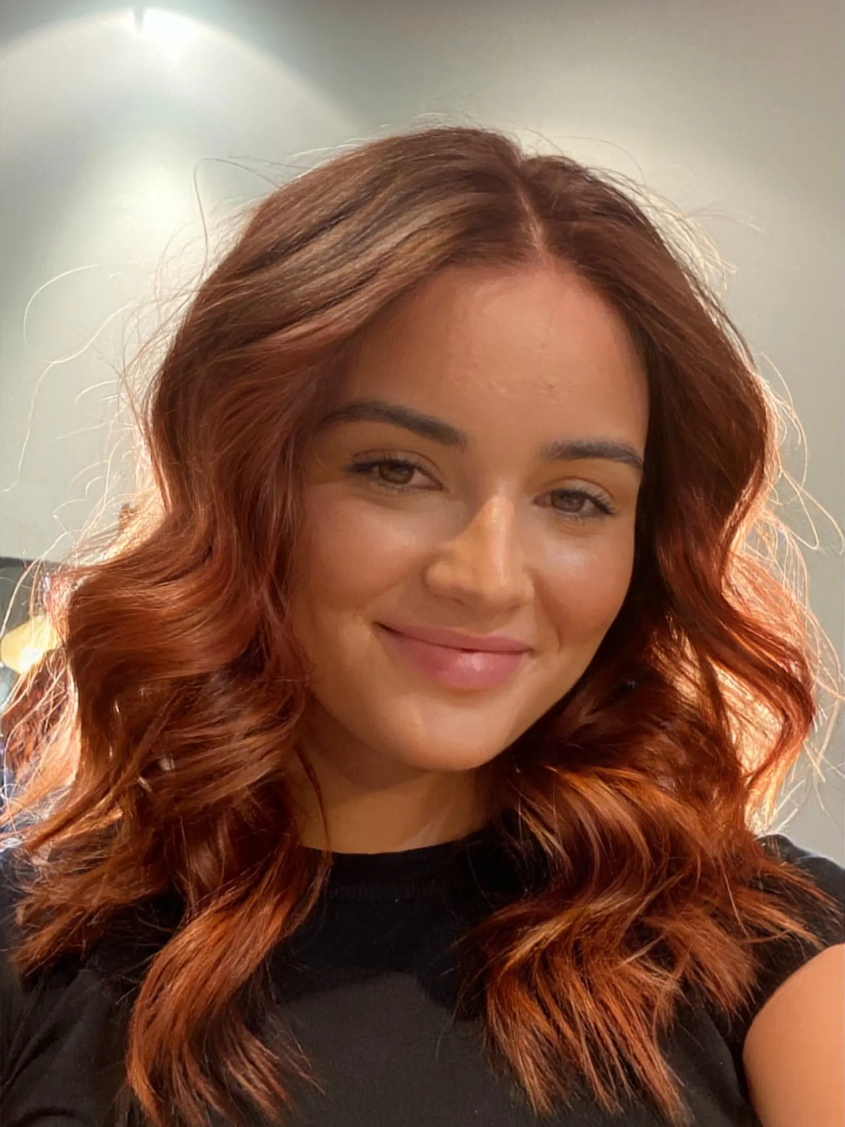 Copper-auburn waves toned and glossed with a NATULIQUE Liquid Colour at Erin Morgan Hair Subiaco
